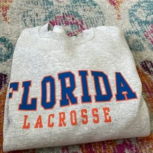 gray/white florida state lacrosse crew neck. size: S. worn once